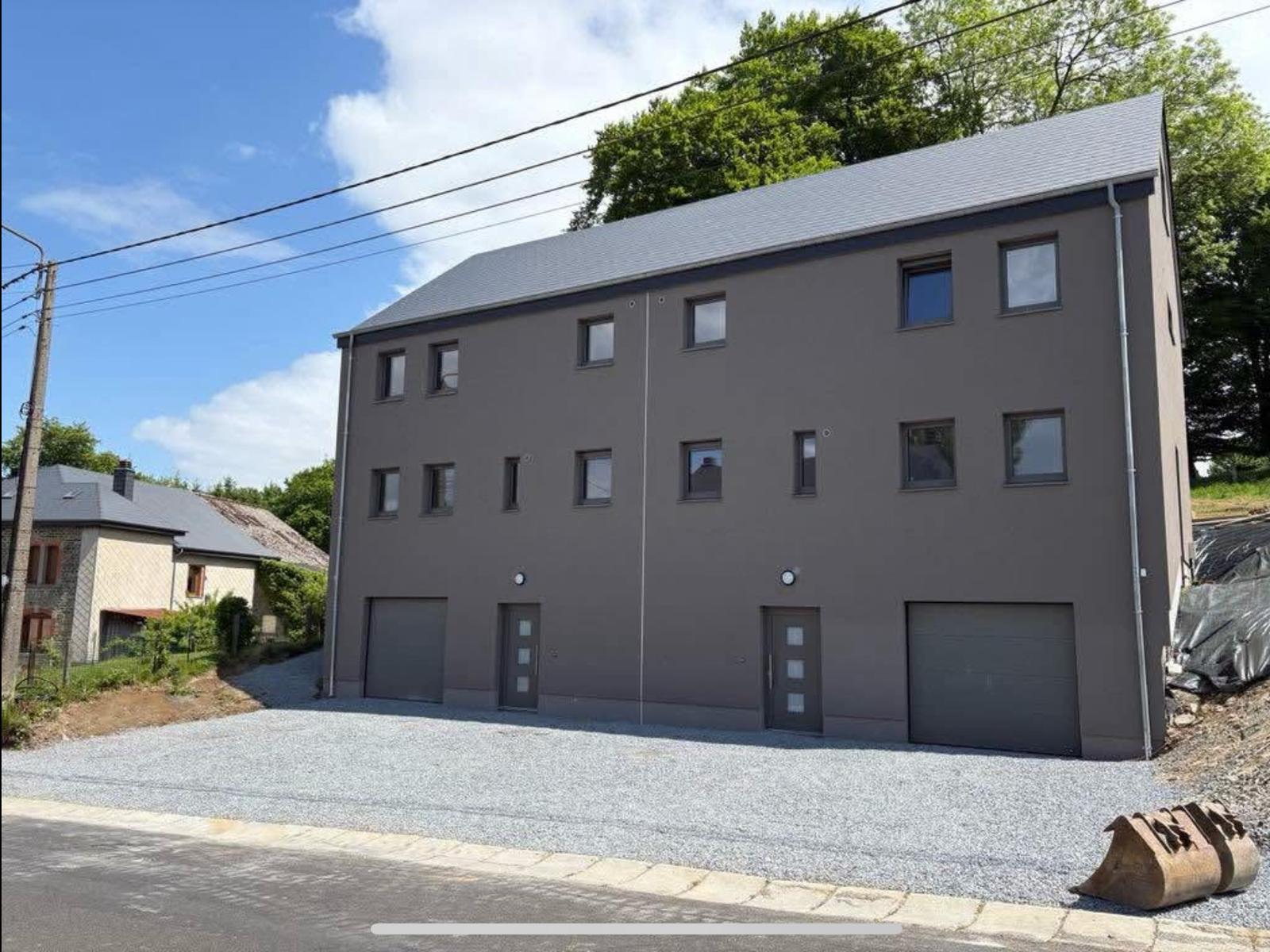 porte de garage sectionnelle motorisée Luxembourg